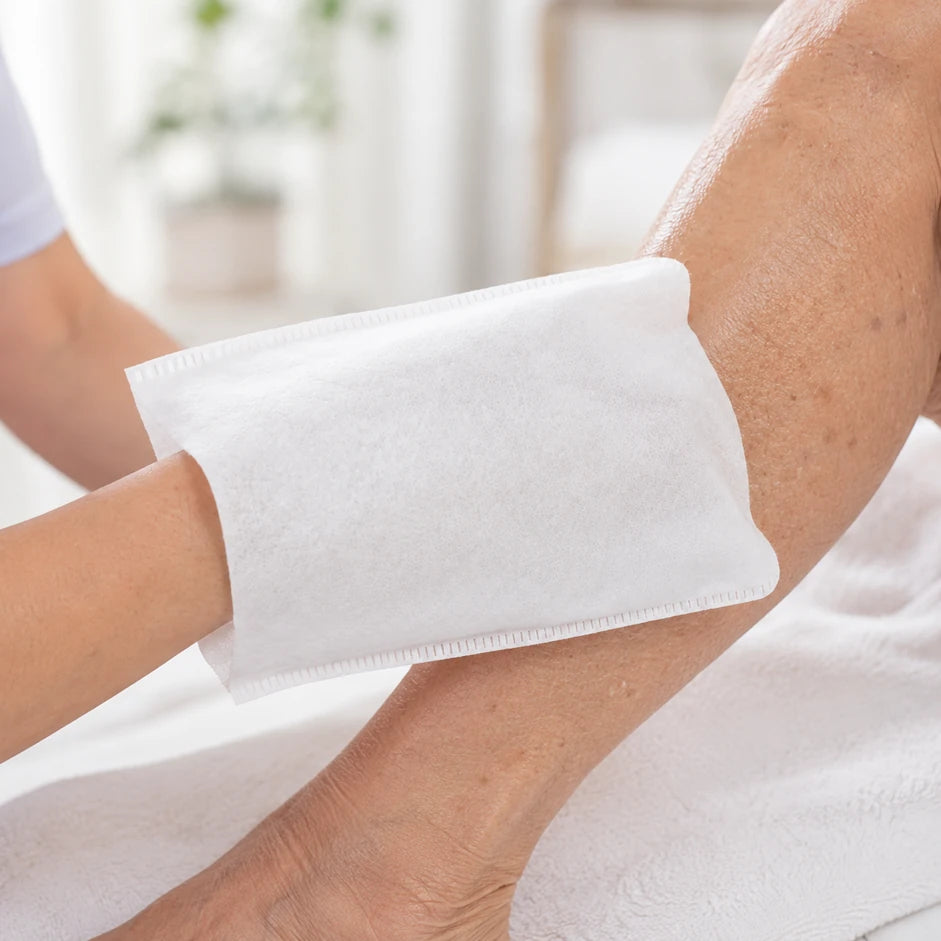 Seni Care Einweg-Waschhandschuhe unfoliert aus Vliesstoff – 50 Stück